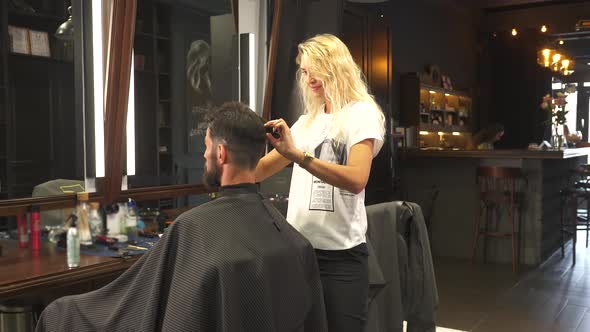 Man's Hair Cutting By Barbers Scissors