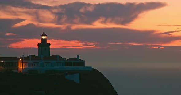 Lighthouse Arnel on Cliff of Atlantic Ocean Ponta Do Arnel