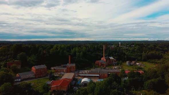 Old Ligatne Paper Mill Village From Above in Ligatne, Latvia. Aerial Dron Shot 4K Video