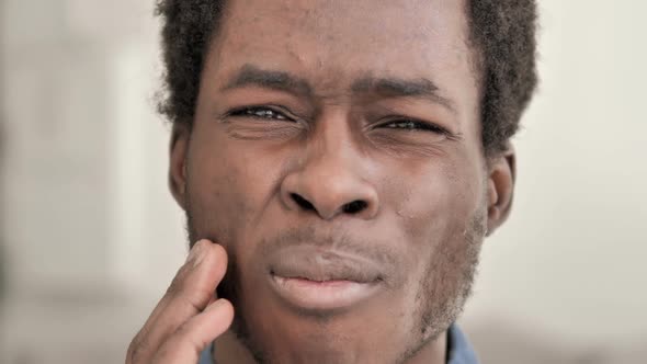 Toothache Close Up of African Man with Tooth Pain