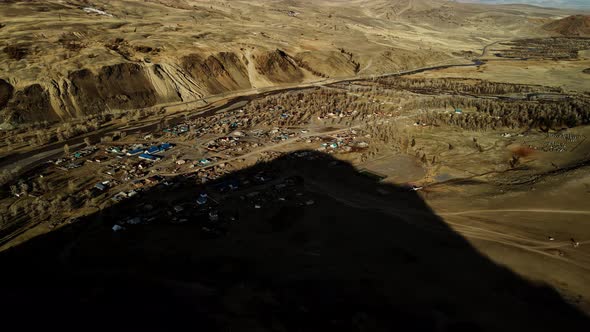 Mountain Village in the Shadow of the Mountain