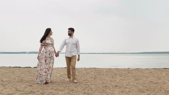 Couple Romantic In Love Walking Near the Water