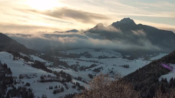 Mountain Winter Landscape the Sun Shines Through the cloudsGolden Hour