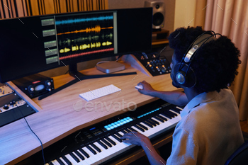 Man Working At Mixing Console