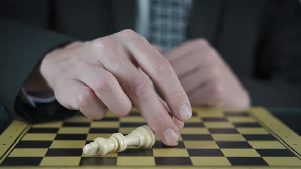 The queen on chess board. Worker think an idea on a chess board. 