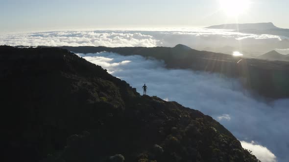 Aerial view of a person standing on the mountain, Reunion.