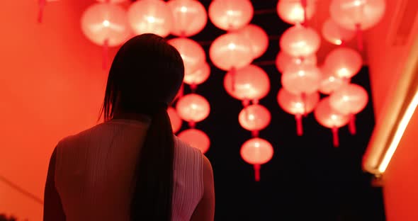 Woman Look at The Red Lantern at Night