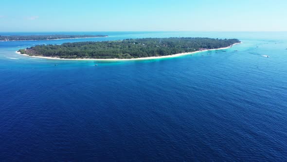 Aerial travel of tranquil shore beach adventure by shallow water and white sand background of a dayo