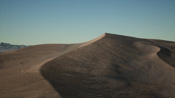 Aerial View on Big Sand Dunes in Sahara Desert at Sunrise