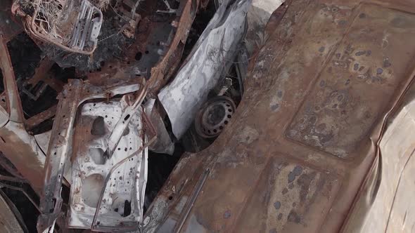 Vertical Video of a Dump of Destroyed Cars During the War in Ukraine