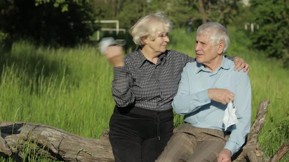 Senior Couple Family Takes Off Medical Masks After Coronavirus Quarantine End