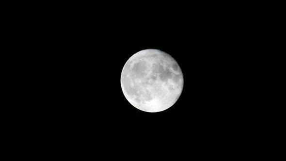 Full Moon On A Dark Night And Clouds