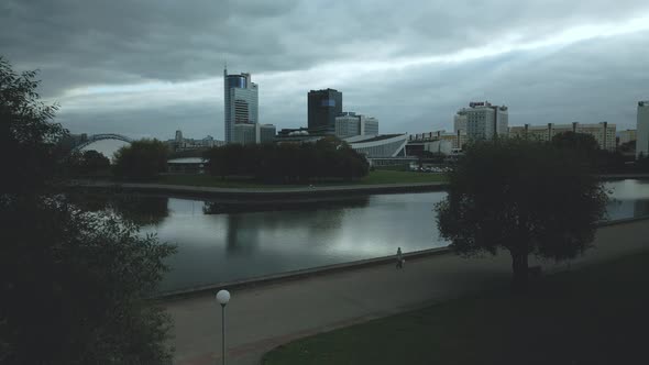 Flight over the city in cloudy weather.