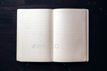 Open notebook on office desk, mockup copy space on blank pages