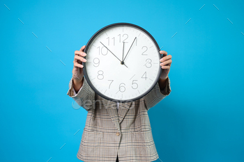 Clock Face Of Businesswoman Showing And Holding Clock