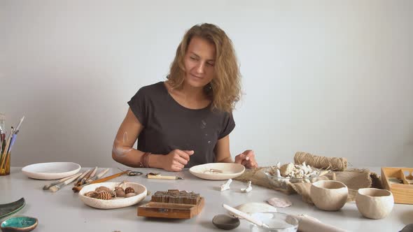 Female Ceramist Working in the Studio