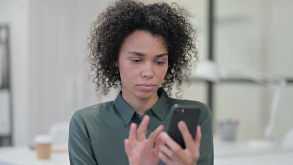 African Woman Reacting To Loss Smartphone