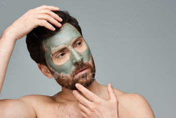 Masked Beauty: Man With Facial Mask