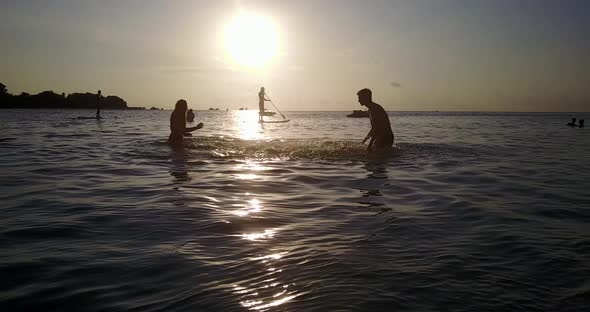 Beautiful couple on honeymoon vacation spend quality time on beach on white sand background