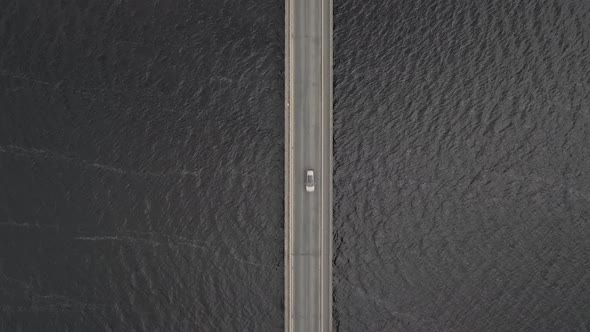 Top View Of Cars Driving On The Bridge Across Blessington Lake In County Wicklow, Ireland. aerial