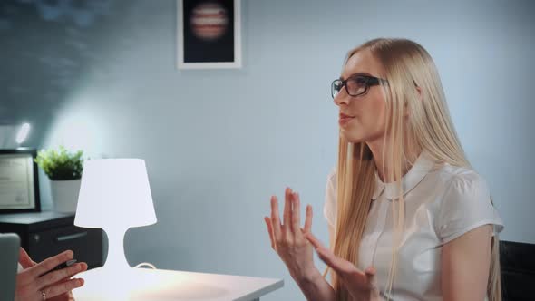 Close-up of Nice Girl Sitting in Psychologist's Cabinet and Speaking About Emotional Experiences