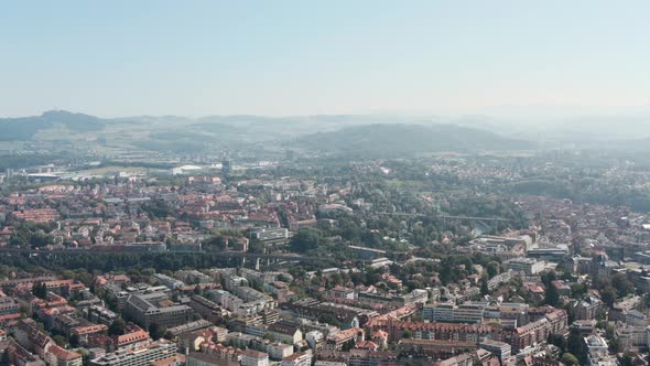 Rising dolly back drone shot of Central Bern Switzerland