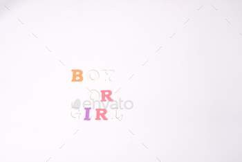 The words boy or girl are depicted in pixel art on a white background