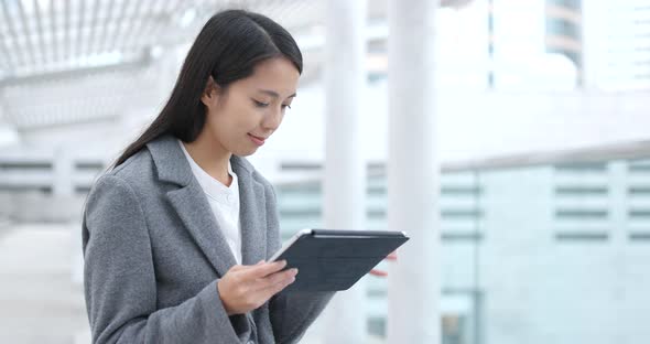 Businesswoman Working on Tablet Computer