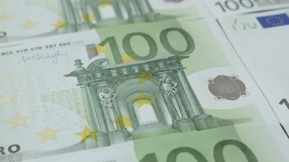 Slow tilt over EU banknotes on table shallow DOF close-up 4K 2160p 30fps UltraHD  footage -European 