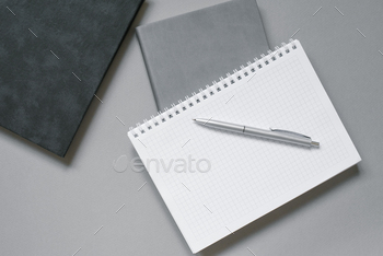 Notebooks or Diaries with Blank Page and Ballpoint Pen on top of them. Office Worker's Place