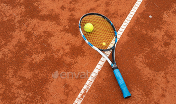 tennis racket with a tennis ball on a tennis court