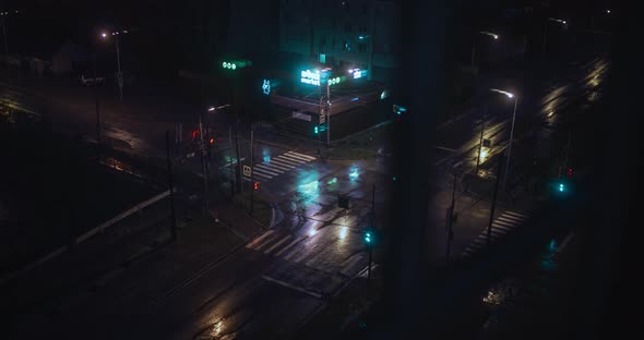 Night crossroads in rainy weather