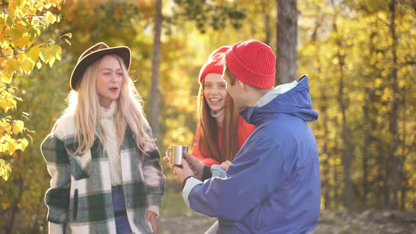 Active Young People Have Fun on Fresh Air in Forest