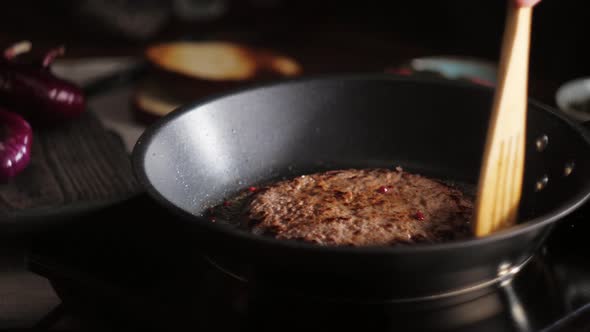 Frying Burger Bread in Pan Closeup