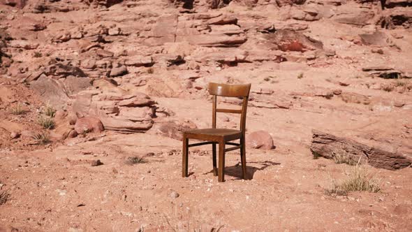 Old Wooden Chair on Rocks of Grand Canyon