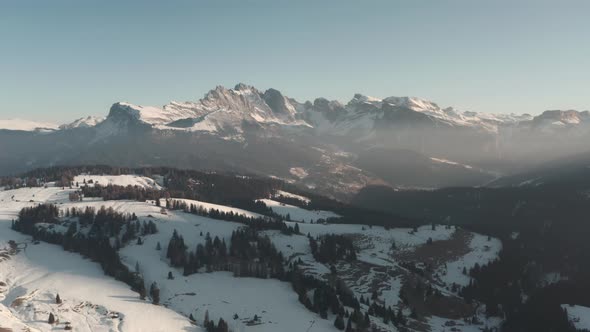 slider drone shot looking towards Seceda ridge Italian dolomites