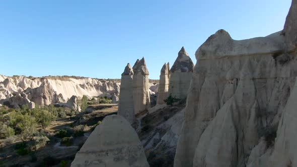 Flying over rock formations at Love Valley, Cappadocia, Turkey