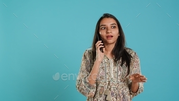 Woman swiping on smartphone touchscreen to answer phone call