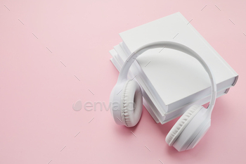 Audio books concept. Headphones on Books