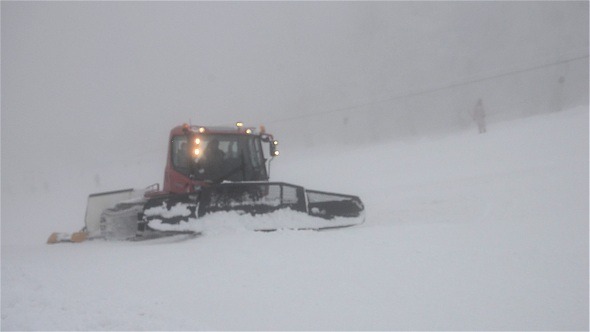 Snowcat And Skiers On Slope 3