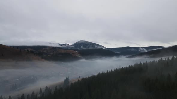 Winter Landscape Of The Carpathian Mountains In The Fog From A Bird's Eye View