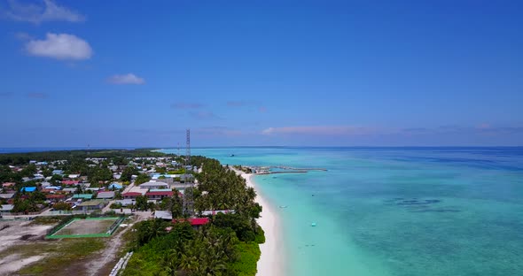 Beautiful birds eye copy space shot of a sunshine white sandy paradise beach and aqua blue water bac