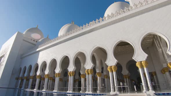 Wide panning shot across the exterior of the Palace Court in Abu Dhabi