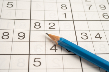 Sudoku puzzle game playing to challenge brain.