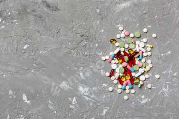 Protective face masks or surgical masks, medicine pills and thermometer on table background