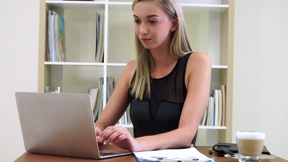 Blonde Business Woman Working at Modern Office