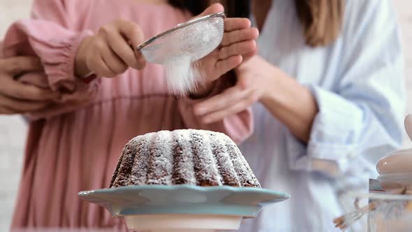 Cute Little Kid Daughter Helping Mom Adding Preparing Dough for Cake Together in Modern Kitchen