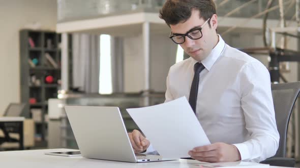 Businessman Working on Documents Paperwork