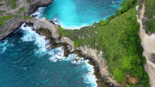 Aerial view at sea and rocks. Nusa Penida, Bali, Indonesia. Seascape from air