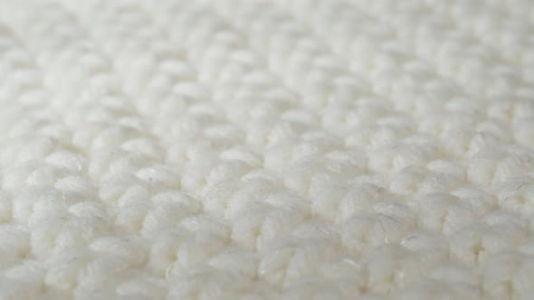 White Knitted Cloth Light Woolen Clothes Fabric Closeup Woven Textile Background